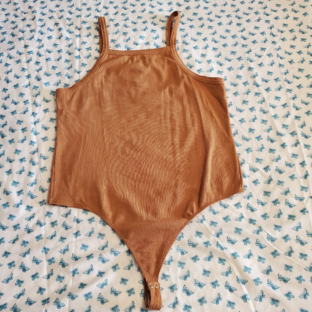 Brown ribbed tank style thong bodysuit.  Size XL  BP.